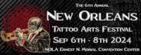 a poster for the new orleans tattoo arts festival